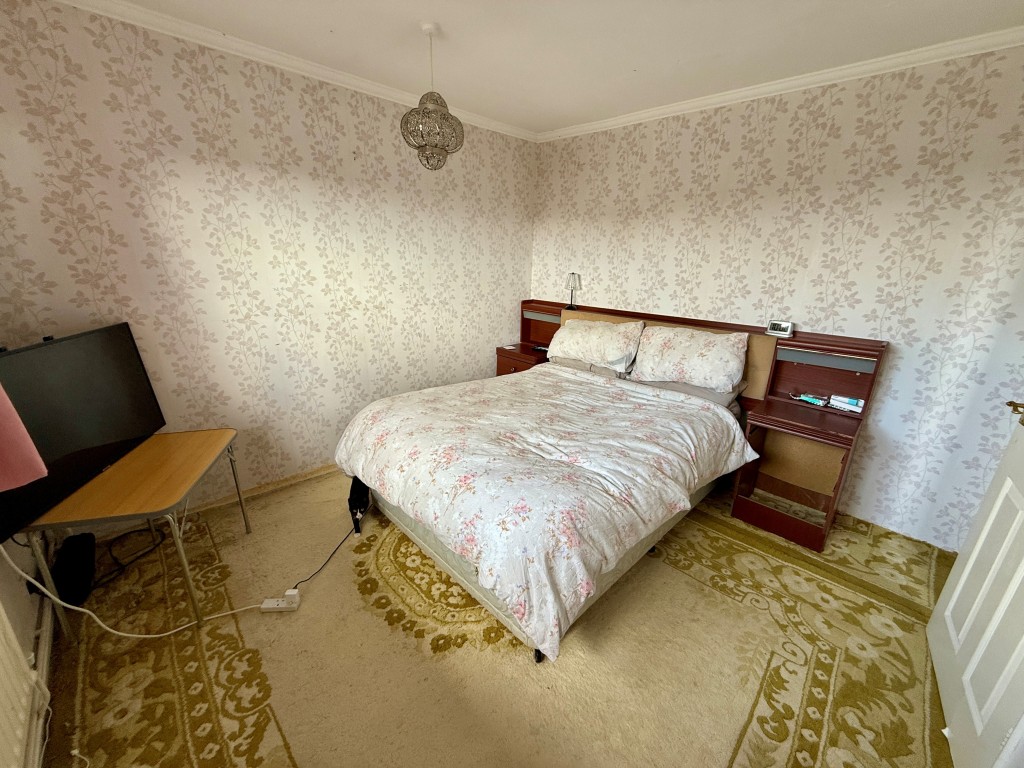 Lot: 106 - THREE-BEDROOM EXTENDED BUNGALOW FOR IMPROVEMENT - Bedroom one